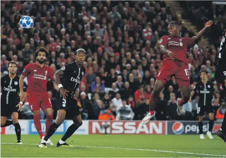  ?? Reuters ?? Daniel Sturridge heads home Liverpool’s first goal against Paris Saint-Germain at Anfield on Tuesday night