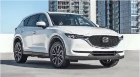  ?? MAZDA VIA AP ?? The 2017 Mazda CX-5 comes with a full suite of technology options, active safety features and driver aids. In its top trim, the CX-5 includes adaptive cruise control and lane keeping assist.