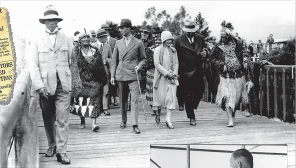  ??  ?? Above, the Duke of York and his wife, who later became King George VI and Queen Elizabeth, visit Whakarewar­ewa Village.