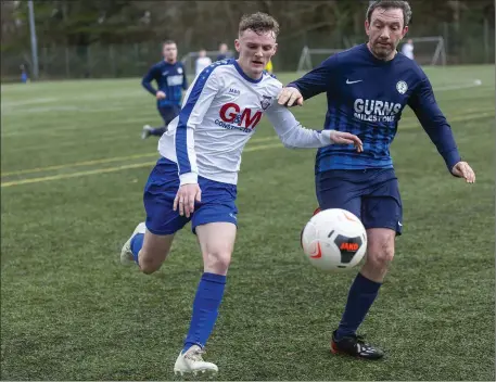  ??  ?? Ryan Hargadon and James Clancy battle for possession. Pics: Donal Hackett.