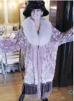  ??  ?? The stylish Andrea Brussa donned a fabulous coat purported once owned by Sharon Stone for the Lady Grey Tea at Lougheed House.