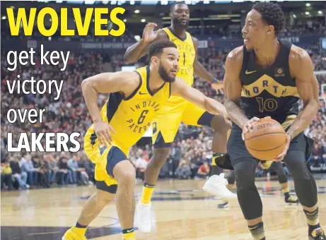  ??  ?? Toronto Raptors guard Demar Derozan (10) controls a ball as Indiana Pacers guard Cory Joseph (6) defends during the third quarter at Air Canada Centre. — USA Today Sports