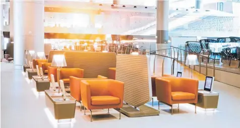  ?? Photo / Supplied ?? Comfy chairs with accessible screens, plugs and charging ports are on the first floor of Qatar Airways’ Business lounge in Doha.