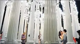  ?? Wally Skalij
Los Angeles Times ?? LACMA’S “Urban Light” by Chris Burden has proved far more popular than its original entrance artwork, “Space Sculpture,” which was lent, sold and forgotten.