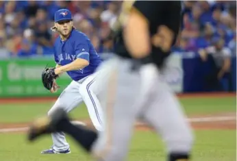  ?? RENÉ JOHNSTON/TORONTO STAR ?? Blue Jays starter Chris Rowley showed off his arm and athleticis­m in Saturday’s MLB debut before 46,000-plus.