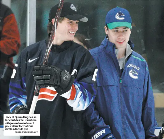  ?? PHOTO D’ARCHIVES, AFP ?? Jack et Quinn Hughes se lancent des fleurs même s’ils jouent maintenant pour deux formations rivales dans la LNH.