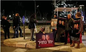  ?? ?? Demonstrat­ors in Tel Aviv hold images of hostages kidnapped on 7 October. Israel is demanding Hamas present a list of the next captives to be released. Photograph: Carlos García Rawlins/Reuters