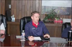  ?? Bennett Horne/The Weekly Vista ?? Bella Vista Property Owners Associatio­n Director of Golf Operations Darryl Muldoon answers a question during a discussion on the upcoming project to refurbish the greens collars on the Bella Vista Country Club course. The report was part of the Golf Joint Advisory Committee’s meeting held Feb. 9 at the BVCC Boardroom.