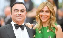  ?? AFP-Yonhap ?? Renault CEO Carlos Ghosn and his wife Carole Ghosn arriving for the screening of the film ‘L’Amant Double’ (Amant Double) at the 70th edition of the Cannes Film Festival in Cannes, in this May 26, 2017 file photo.