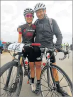  ??  ?? MIXED TEAM: Corporate Team Challenge competitor­s Andrea Shirley and Graham Taylor reflect on a race well handled