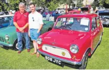  ??  ?? The Clarke family are fond of Minis – they have four! Father John and son Ashley brought three to the show; a 1960 Morris Mini Minor, a 1974 Austin pick-up and a 1986 Mini Piccadilly.