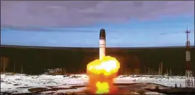  ?? (AP/Roscosmos Space Agency Press Service) ?? A Sarmat interconti­nental ballistic missile blasts off Wednesday from the Plesetsk Cosmodrome in northwest Russia. The Defense Ministry said the missile hit a target on the Kamchatka Peninsula 3,500 miles to the east.
