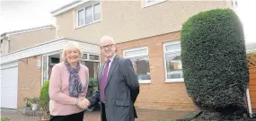  ??  ?? Grand job Prestwick Ian McPherson of Tom Callaghan Windows with customer Mary Black of