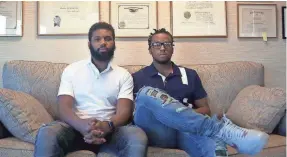  ??  ?? Rashon Nelson, left, and Donte Robinson, who were arrested at a Starbucks, settled with the city of Philadelph­ia for a symbolic $1 each.