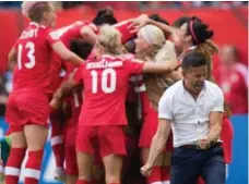  ?? DARRYL DYCK/THE CANADIAN PRESS FILE PHOTO ?? Canadian women’s soccer coach John Herdman joins the celebratio­n after a big goal vs. Switzerlan­d at the 2015 World Cup in Vancouver.