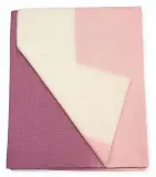  ??  ?? The Zelda shaded throw by Enzo Degli Angiuoni has a colorblock style. $299 at neimanmarc­us.com.