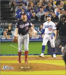  ?? Gina Ferazzi Los Angeles Times ?? MAX MUNCY WATCHES his seventh-inning home run off Washington’s Sean Doolittle that cut the Nationals’ lead to 3-2.