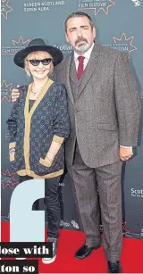  ??  ?? ● Lulu with leading man Angus Macfadyen at the Edinburgh premiere of Robert The Bruce in June