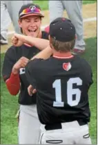  ?? AUSTIN HERTZOG - DIGITAL FIRST MEDIA ?? Shortstop Michael Raineri and pitcher Andrew Bauer do their postgame handshake after defeating Cumberland Valley in the PIAA Class AAAA semifinals on Thursday at Ephrata.