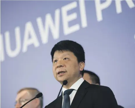  ??  ?? Huawei chairman Guo Ping announces the lawsuit at a press conference in Shenzhen on Thursday