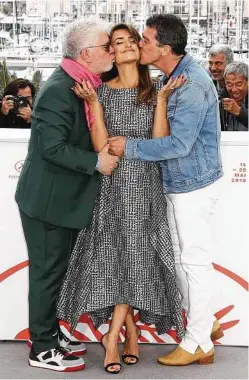  ?? Joel C Ryan / Associated Press ?? Director Pedro Almodovar, from left, and actors Penelope Cruz and Antonio Banderas pause at Cannes on May 18.