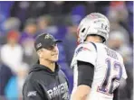  ?? JULIO CORTEZ/AP ?? The Ravens and coach John Harbaugh haven’t faced star quarterbac­k Tom Brady, now with Tampa Bay, since going up against the Patriots in 2019 at M&T Bank Stadium.