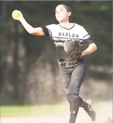  ?? Krista Benson / For Hearst Connecticu­t Media ?? Barlow shortstop Abby Ota makes a play during a game against Masuk on May 2 in Monroe.