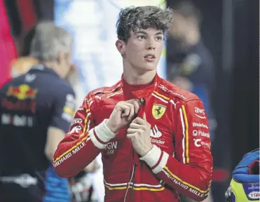  ?? ?? Ferrari’s British reserve driver Ollie Bearman stands in the garage after qualifying 11th in Jeddah