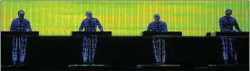  ??  ?? Enigmatic performers: Kraftwerk on stage at first of three sold-out concerts