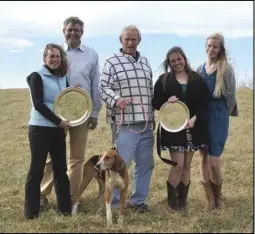  ?? Photo by Lauren R. Giannini ?? BIG BOY, the Gone Away Hound Race winner, and his owner Rogers Gibson, are flanked by (from left) Beth and Erwin Opitz, Elida Optiz and German exchange student Hannah Bever.