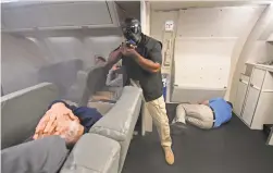  ?? PHOTOS BY ROBERT DEUTSCH/USA TODAY ?? 2. Armed air marshals regain control of the jetliner. Marshals fly on commercial flights in civilian clothes with their guns hidden, on alert for terrorist threats.