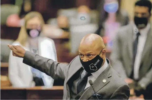  ?? AP FILE PHOTO ?? House Speaker Emanuel “Chris” Welch motions across the chamber as he speaks May 28 about a bill that would redraw the legislativ­e district map.
