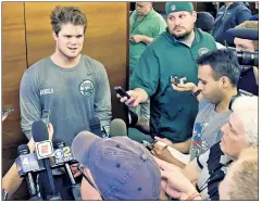  ?? Bill Kostroun ?? BRIGHT LIGHTS: Sam Darnold speaks to the media before taking the field for Friday’s rookie minicamp.