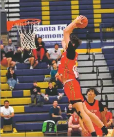  ?? MARTY SAIZ/Facebook ?? Isaiah Carr flies high for a twohanded slam on Saturday (March 19).