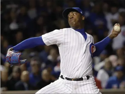  ?? DAVID J. PHILLIP — ASSOCIATED PRESS ?? Cubs closer Aroldis Chapman throws during the seventh inning of Game 5 of World Series game against Indians on Sunday in Chicago.