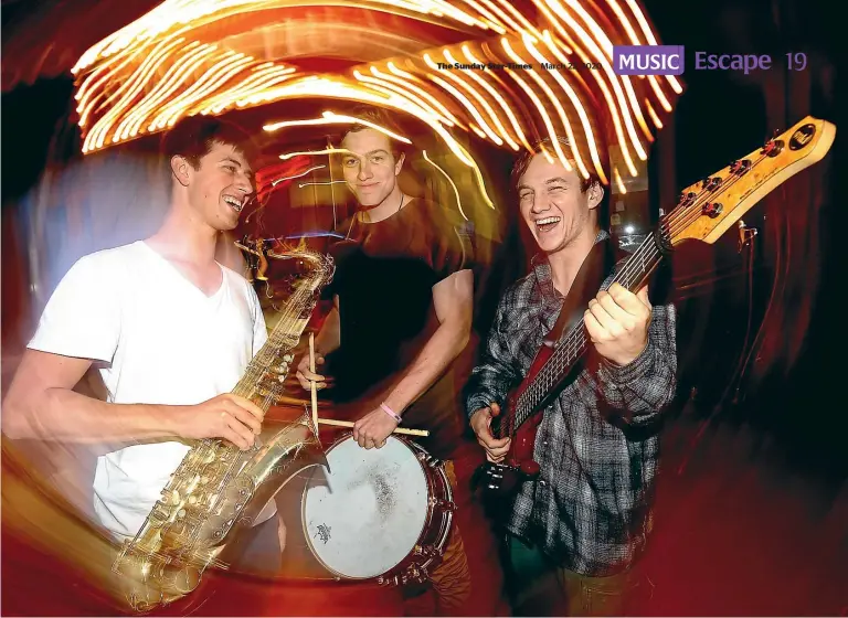  ?? KENT BLECHYNDEN/ STUFF ?? Drax Project’s early trio, from left, Shaan Singh, Matt Beachen and Sam Thomson busking on Wellington’s Courtenay Place in 2013.