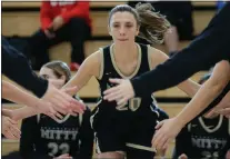  ?? PHOTOS BY JOSEPH DYCUS — STAFF ?? Archbishop Mitty forward McKenna Woliczko entered the month 19.8 points and 10.7 rebounds as a 14-year-old high school freshman.