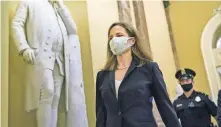  ??  ?? Judge Amy Coney Barrett, President Donald Trump's nominee for the Supreme Court, arrives for closed meetings Wednesday at the Capitol in Washington [J. SCOTT APPLEWHITE/ THE ASSOCIATED PRESS]