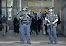  ?? BEBETO MATTHEWS/AP PHOTO ?? A New York Police Department anti-terror unit guard an entry area to Madison Square Garden, Tuesday, in New York. The NYPD says it has tightened security at high-profile locations “out of an abundance of caution” following the deadly explosion in...