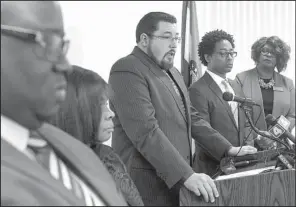  ?? AP/J.B. FORBES ?? Ferguson, Mo., Mayor James Knowles (center) talks to reporters Wednesday along with (from left) City Manager DeCarlon Seewood, council members Laverne Mitchom, Wesley Bell and Ella Jones.