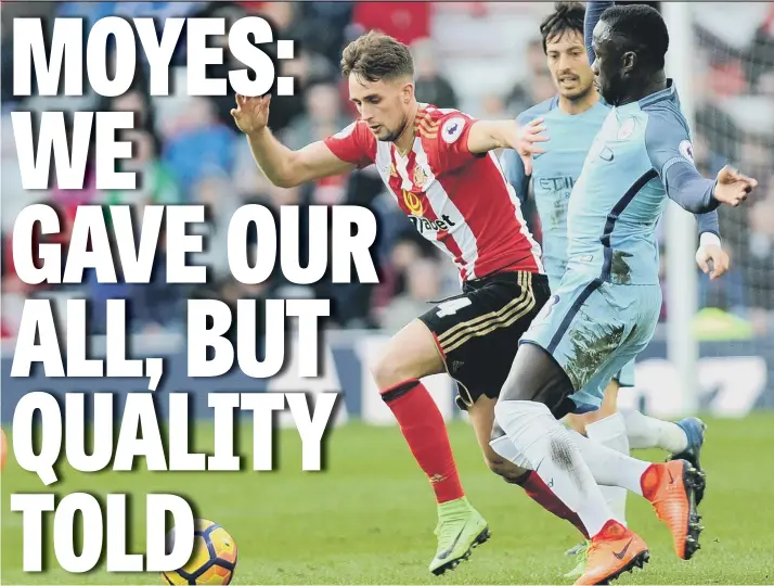  ??  ?? Sunderland’s Adnan Januzaj tries to get away from Manchester City defender Bacary Sagna in yesterday’s 2-0 Premier League defeat at the Stadium of Light. Picture by Frank Reid