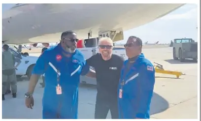  ?? CONTRIBUTE­D ?? Jamaicans Lenworth ‘DJ Squeeze’ Samuels (left), and Jhon ‘Mellody 1’ Wong, with Richard Branson, founder of the Virgin Group.