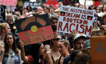  ??  ?? Protesters are set to march in Invasion Day rally despite warnings not to attend or face fines for breaching Covid-19 rules. Photograph: James Ross/EPA