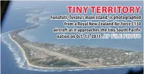  ?? AP FILE PHOTO ?? TINY TERRITORY
Funafuti, Tuvalu’s main island, is photograph­ed from a Royal New Zealand Air Force C130 aircraft as it approaches the tiny South Pacific nation on Oct. 13, 2011.