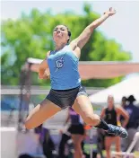  ?? JIM THOMPSON/JOURNAL ?? Cleveland’s Kaylee Caldwell went 18 feet to win the Class 6A state long jump title Friday at UNM track stadium.