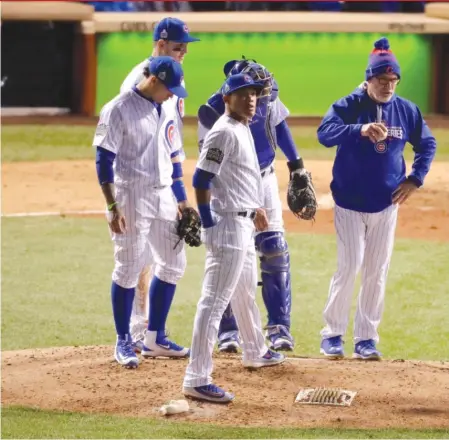  ?? | GETTY IMAGES ?? Manager Joe Maddon turned the ball over to closer Aroldis Chapman in the seventh inning Sunday and was rewarded.