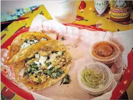  ?? PHOTOS BY LIZ BALMASEDA/ THE PALM BEACH POST ?? Delicious duo at Taquería Taco Chula.