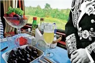  ??  ?? in the lap of luxury: Dining on the train. Right: Tsar Nicholas