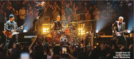 ??  ?? Immersive: U2 performing in Tulsa , Oklahoma