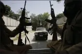  ?? RAHMAT GUL — THE ASSOCIATED PRESS ?? Taliban fighters patrol in Kabul, Afghanista­n, on Thursday.